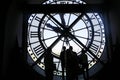 Silhouettes people with the clock at Orsay Museum (MusÃ©e d'Orsay), Paris